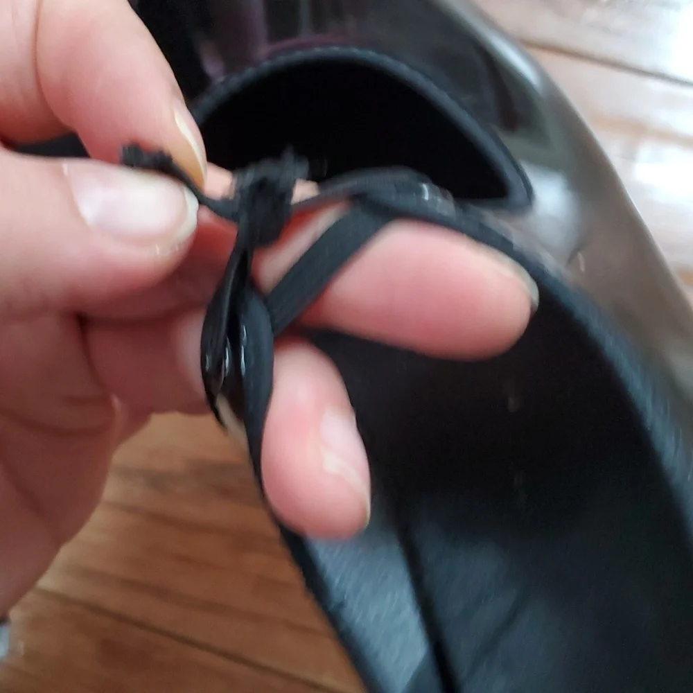 Black patent tap dance shoes